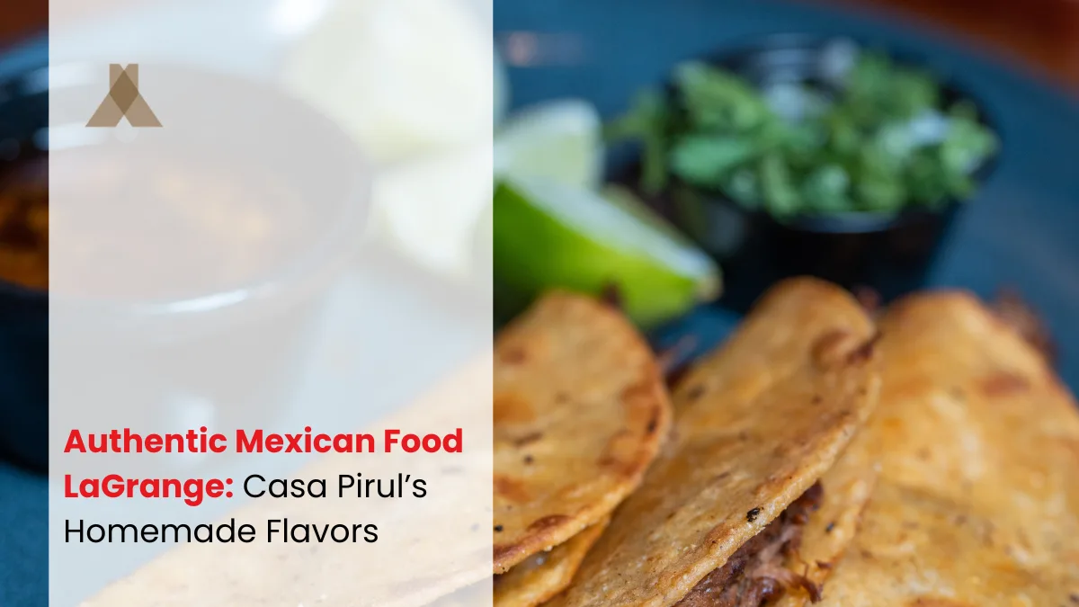 Crispy corn tacos on a dark plate with a lime wedge, chopped cilantro and a bowl of salsa on the side