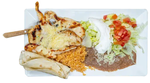 Pollo Loco: grilled chicken breast topped with melted cheese, served with Mexican rice, refried beans, lettuce, sour cream, pico de gallo and flour tortillas